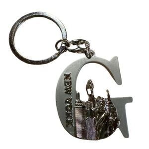 G shaped New York silver keychain